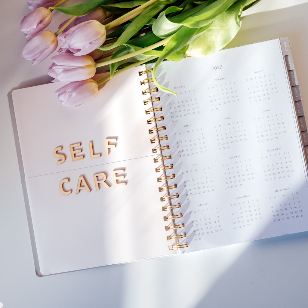 self care tracker depicted by a normal notebook